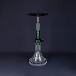 Six hookah wholesale models with clear ribbed glass bases and colored aluminum stems, shown with matching colored metal shisha hoses on a dark studio background